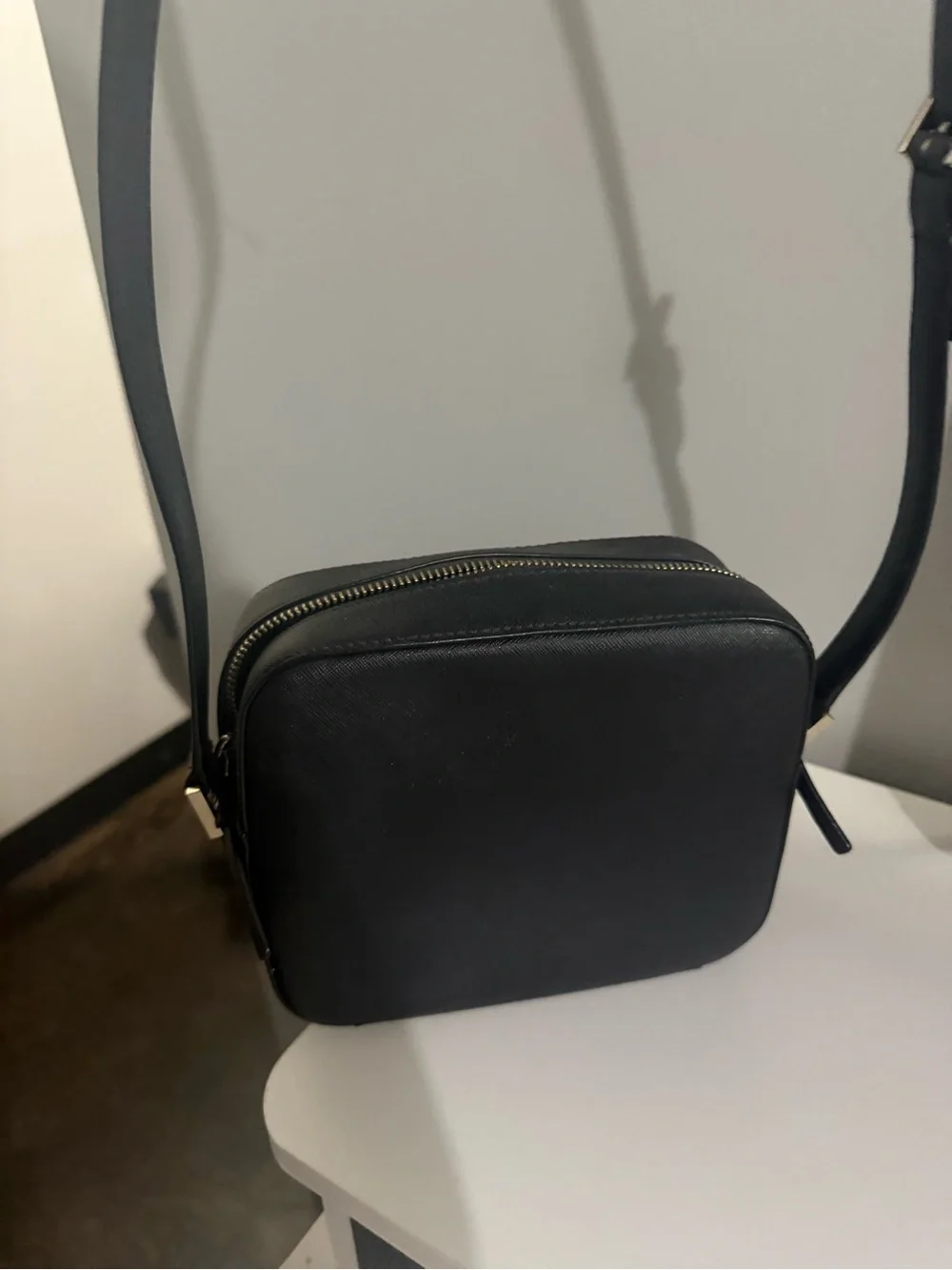 kate spade black crossbody camera bag with gold logo